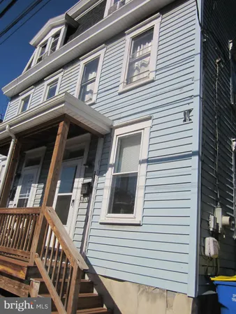 a view of a house with street