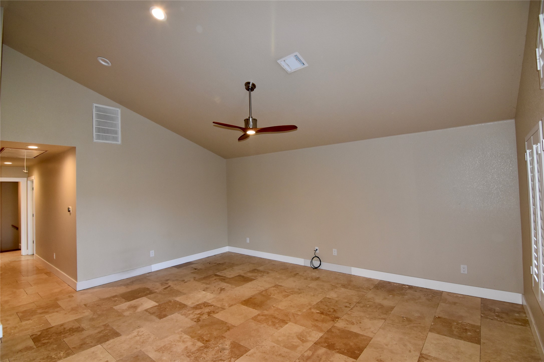 112 Ridge Harbor Drive Spicewood, TX 78669 - Photo 15 of 40 a view of empty room with ceiling fan