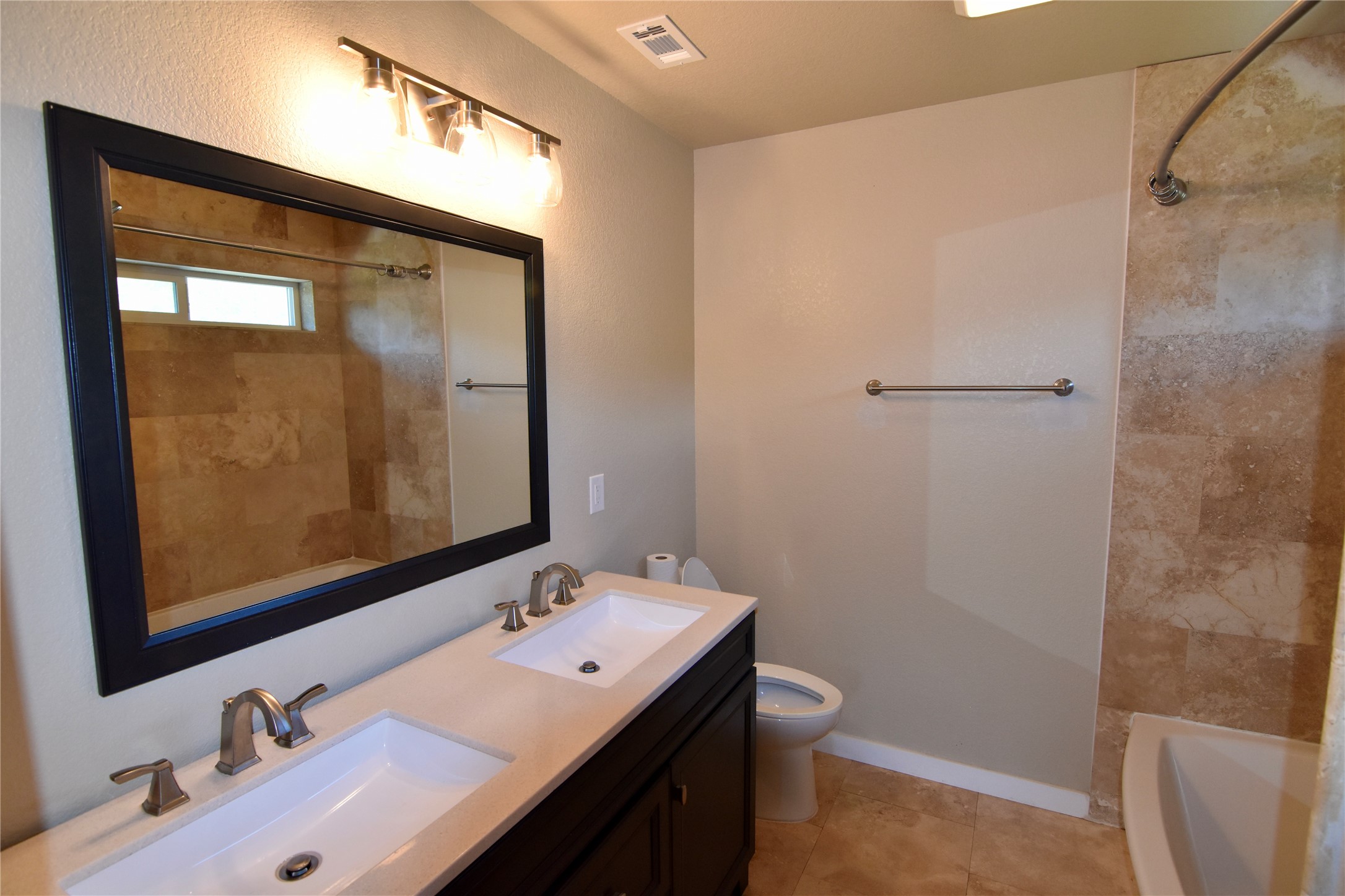 112 Ridge Harbor Drive Spicewood, TX 78669 - Photo 17 of 40 a bathroom with a sink and a mirror
