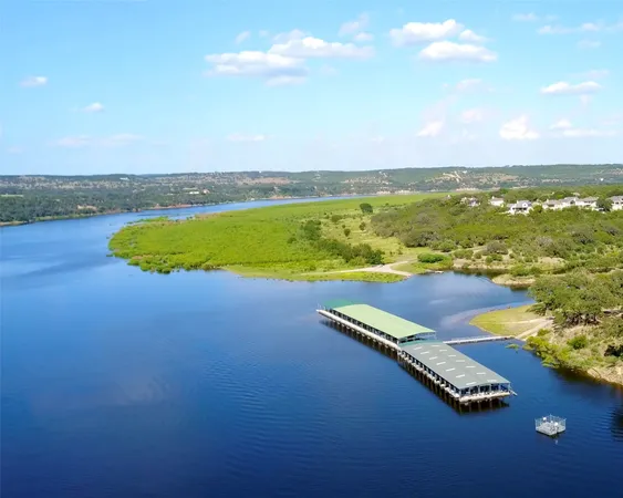 a view of a lake with a house