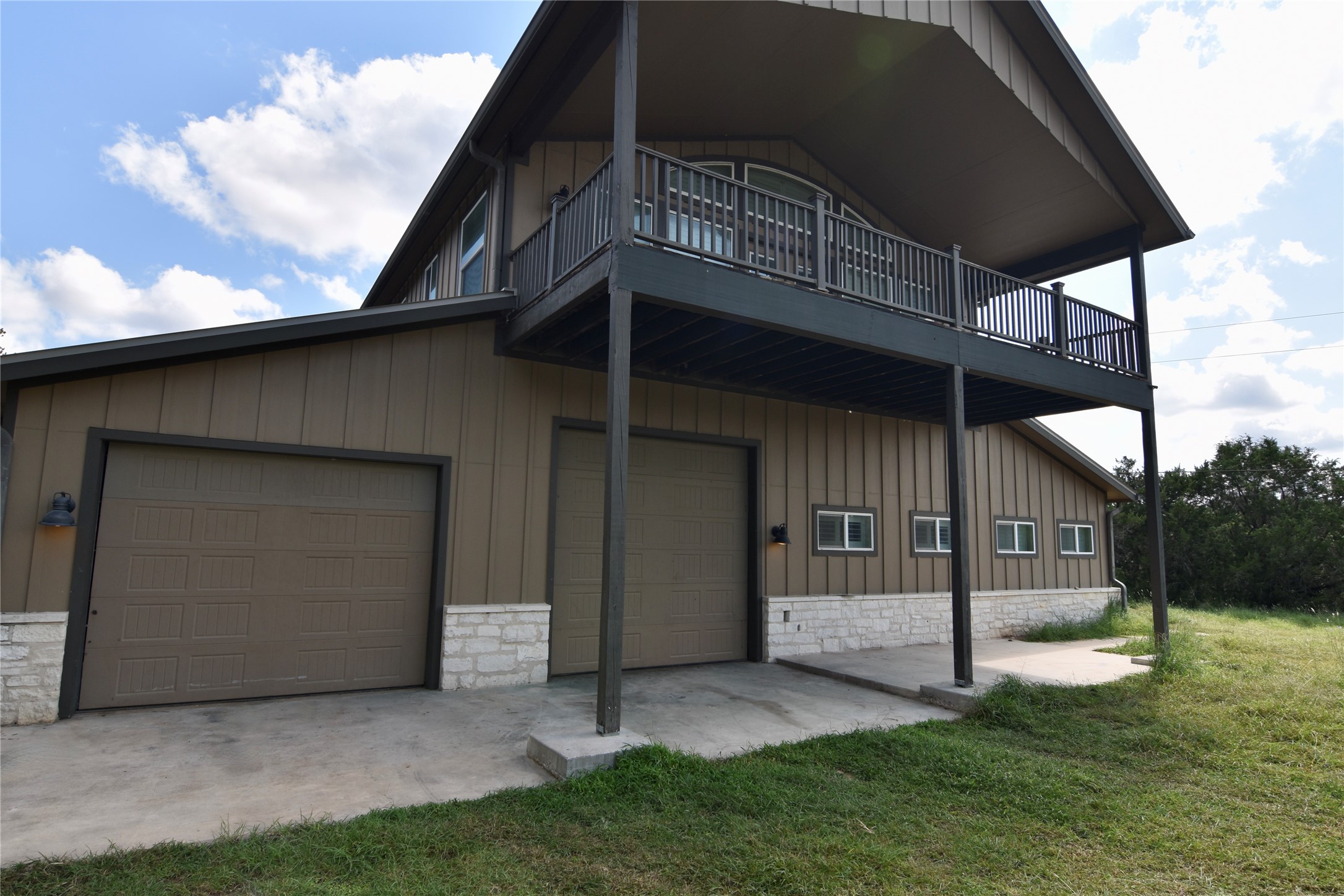 112 Ridge Harbor Drive Spicewood, TX 78669 - Photo 38 of 40 a view of a house with a yard