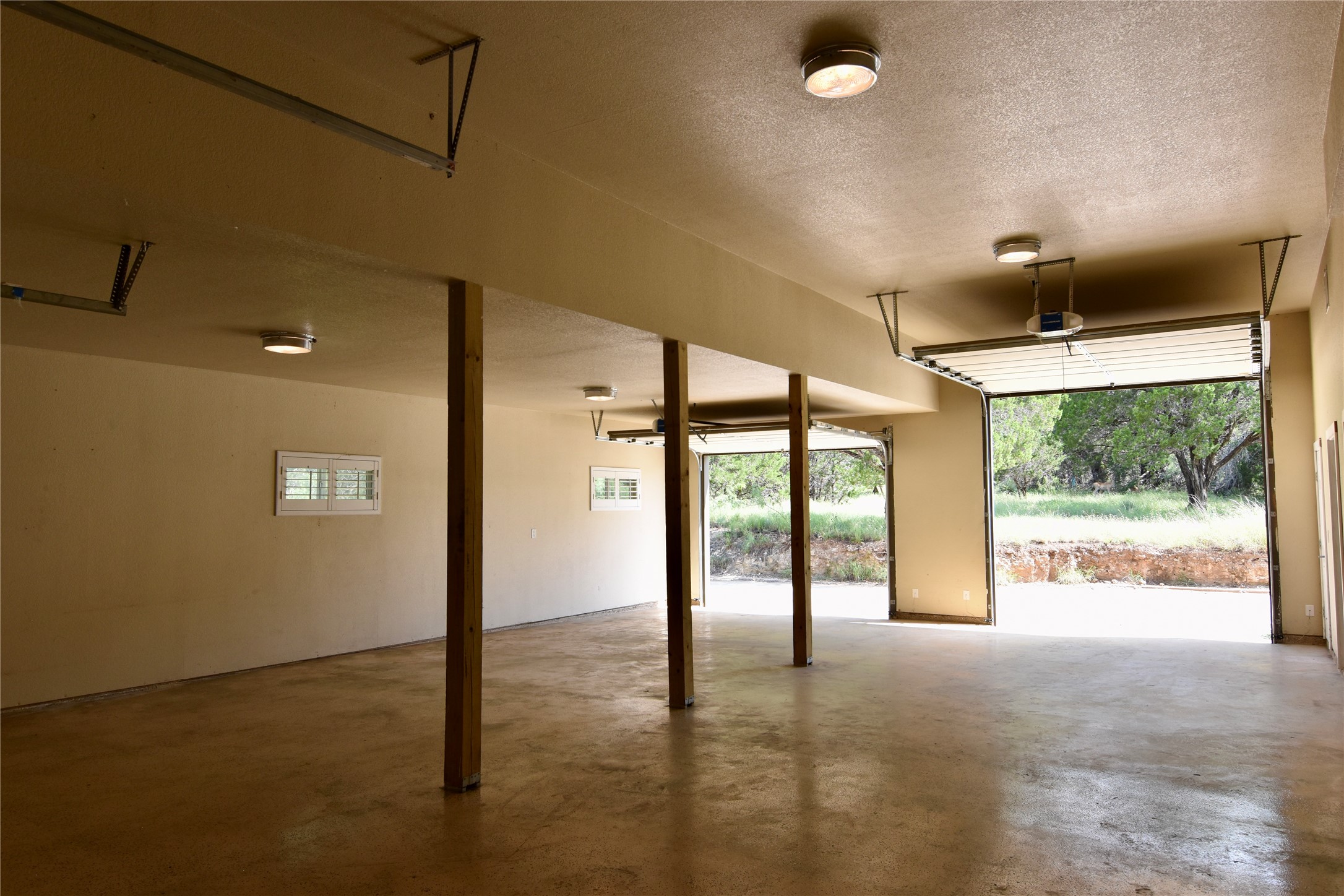 112 Ridge Harbor Drive Spicewood, TX 78669 - Photo 7 of 40 a view of an empty room with a window