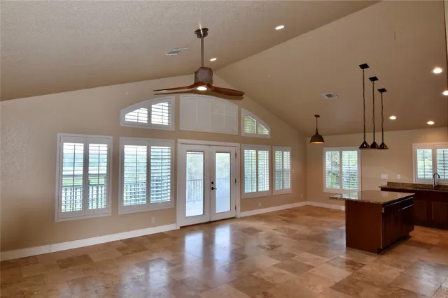 a view of an entryway with kitchen