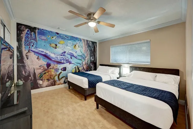 a bedroom with a bed and ceiling fan