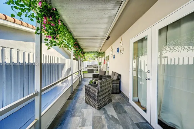 a view of a balcony with couch