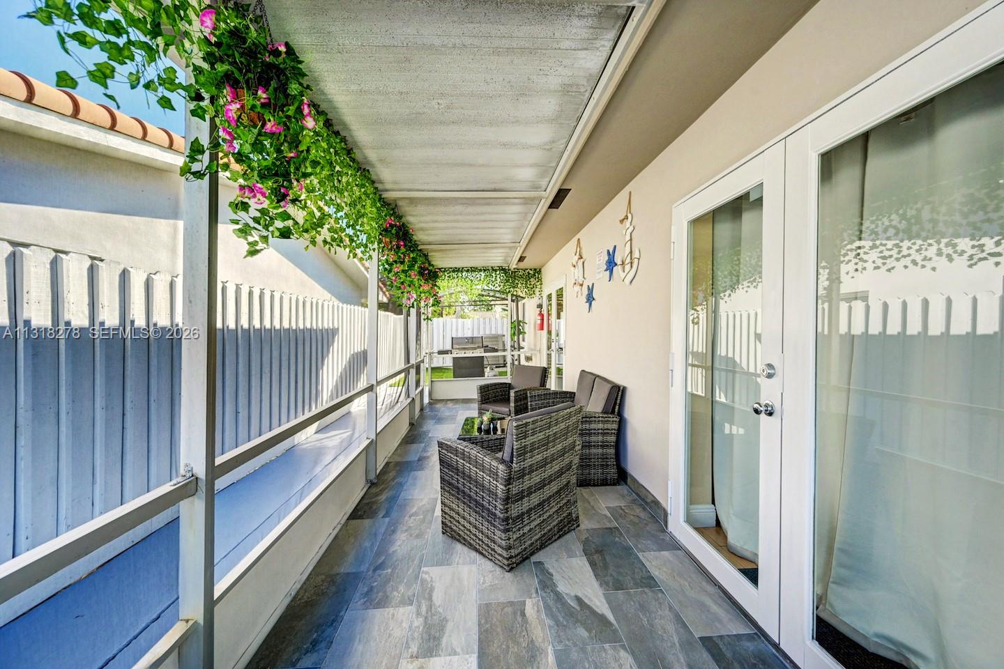 825 Harrison Street Hollywood, FL 33019 - Photo 27 of 37 a view of a balcony with couch