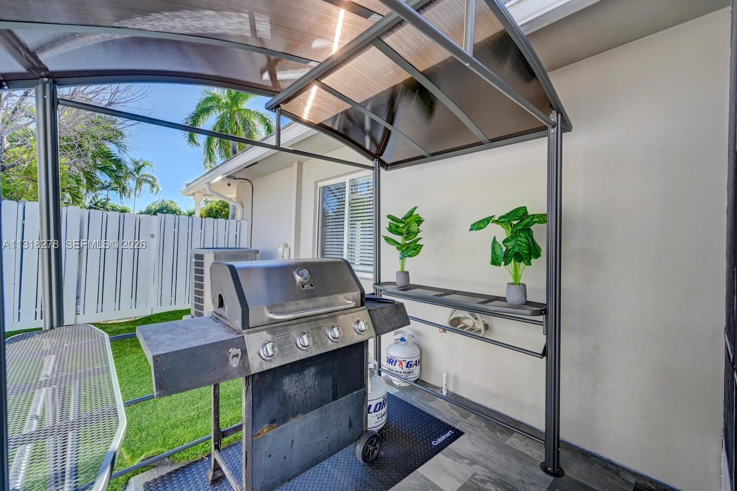 825 Harrison Street Hollywood, FL 33019 - Photo 28 of 37 a view of an outdoor sitting area