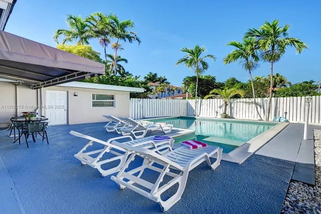 an outdoor space with furniture