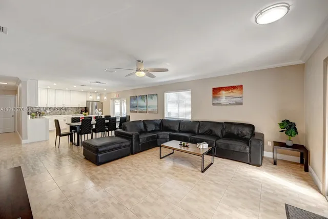 a living room with furniture and a table