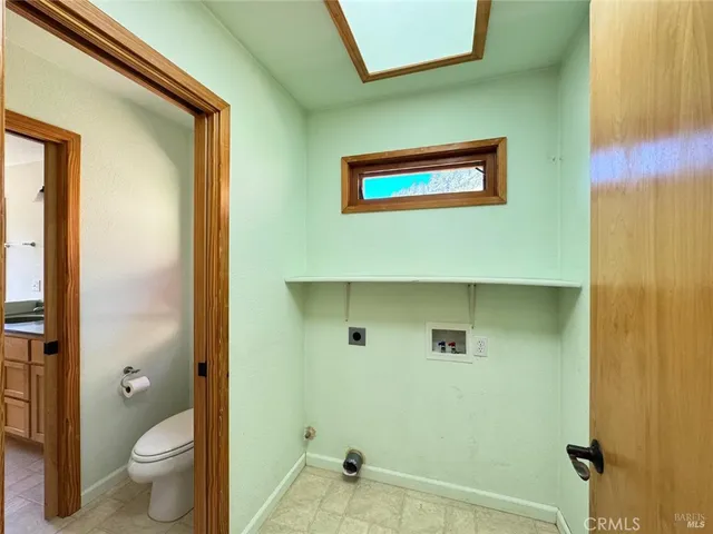 a view of a bathroom with a sink and a toilet