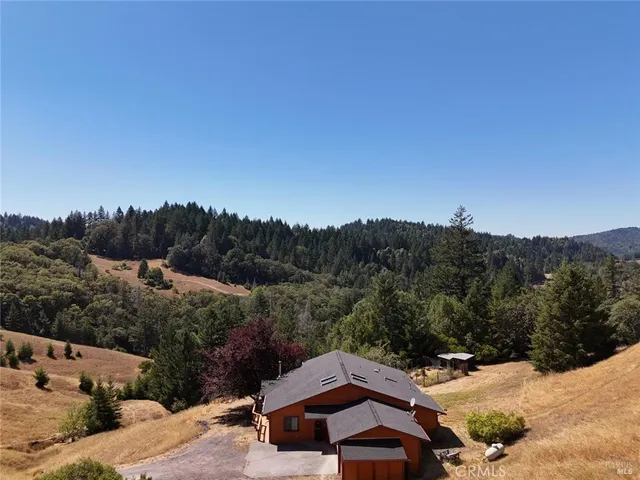 a view of a patio with a mountain