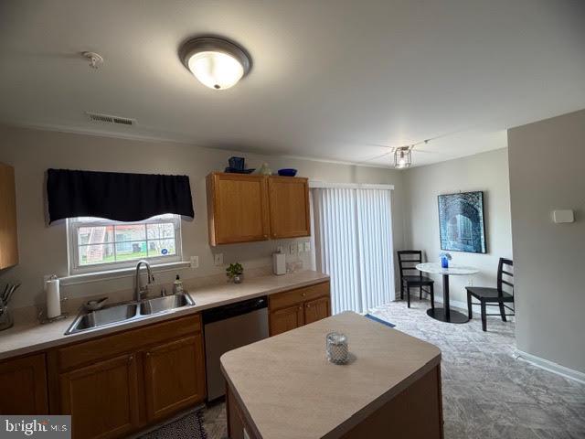 5534 Rockfish Way Clinton, MD 20735 - Photo 19 of 46 a kitchen with a sink cabinets and window