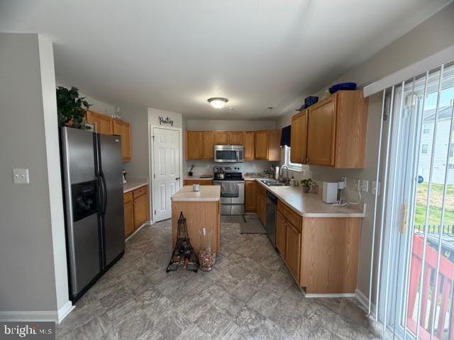 5534 Rockfish Way Clinton, MD 20735 - Photo 21 of 46 a kitchen with refrigerator and cabinets