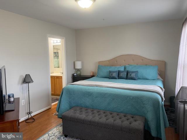 5534 Rockfish Way Clinton, MD 20735 - Photo 27 of 46 a bedroom with a bed and a window