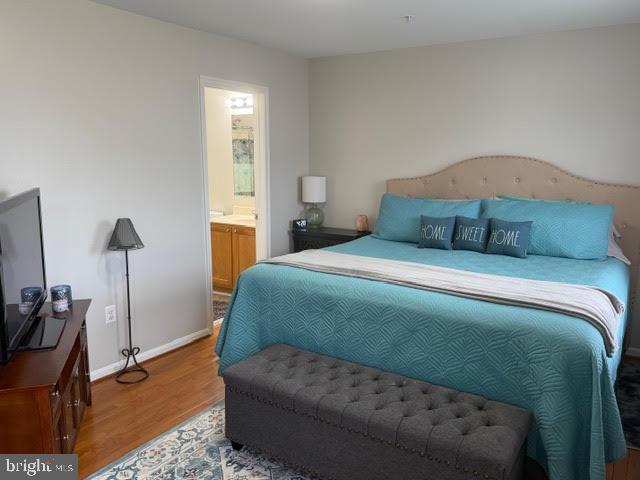 5534 Rockfish Way Clinton, MD 20735 - Photo 28 of 46 a bedroom with a bed and a window
