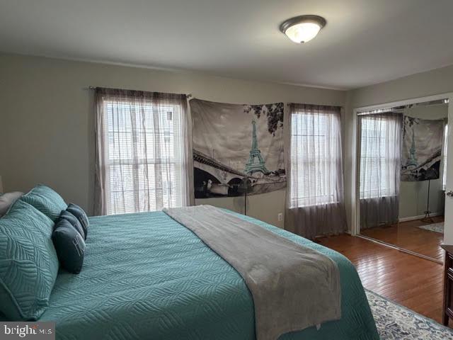 5534 Rockfish Way Clinton, MD 20735 - Photo 29 of 46 a bedroom with a bed and a large window