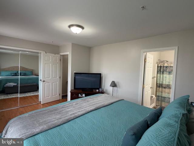 5534 Rockfish Way Clinton, MD 20735 - Photo 31 of 46 a bedroom with a bed and a television