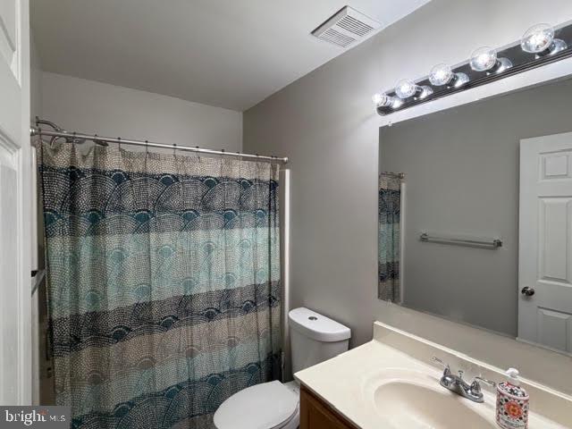 5534 Rockfish Way Clinton, MD 20735 - Photo 32 of 46 a bathroom with a sink toilet and shower