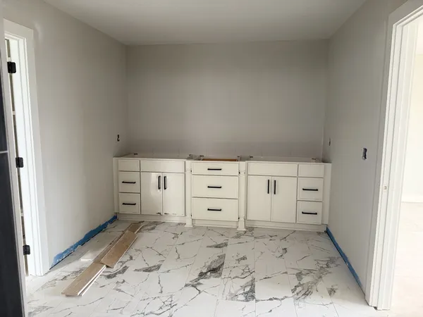 an empty room with windows