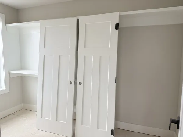 a view of a window in an empty room