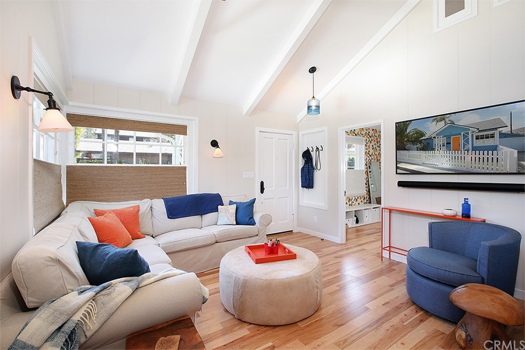 535 Through Street Laguna Beach, CA 92651 - Photo 3 of 23 a living room with furniture and a flat screen tv