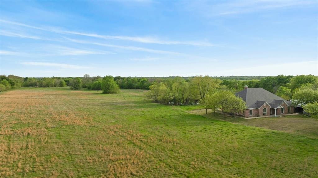 6559 Fm 2068 Commerce, TX 75428 - Photo 16 of 40 a view of a field with an ocean