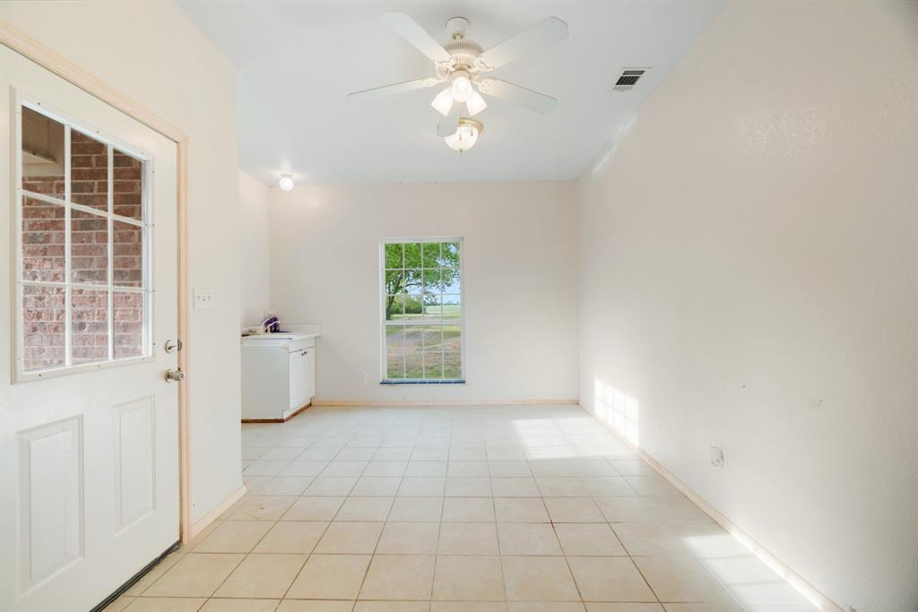 6559 Fm 2068 Commerce, TX 75428 - Photo 21 of 40 a view of an empty room with a window