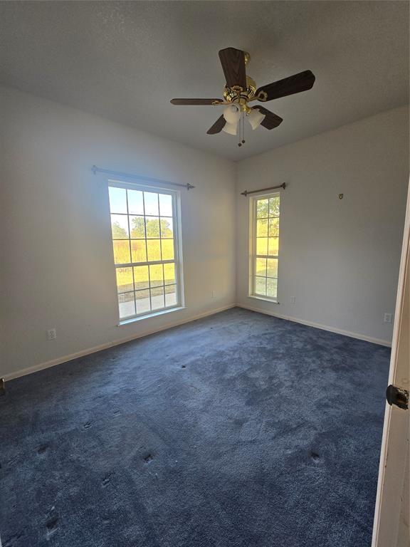 6559 Fm 2068 Commerce, TX 75428 - Photo 22 of 35 a view of an empty room with a window