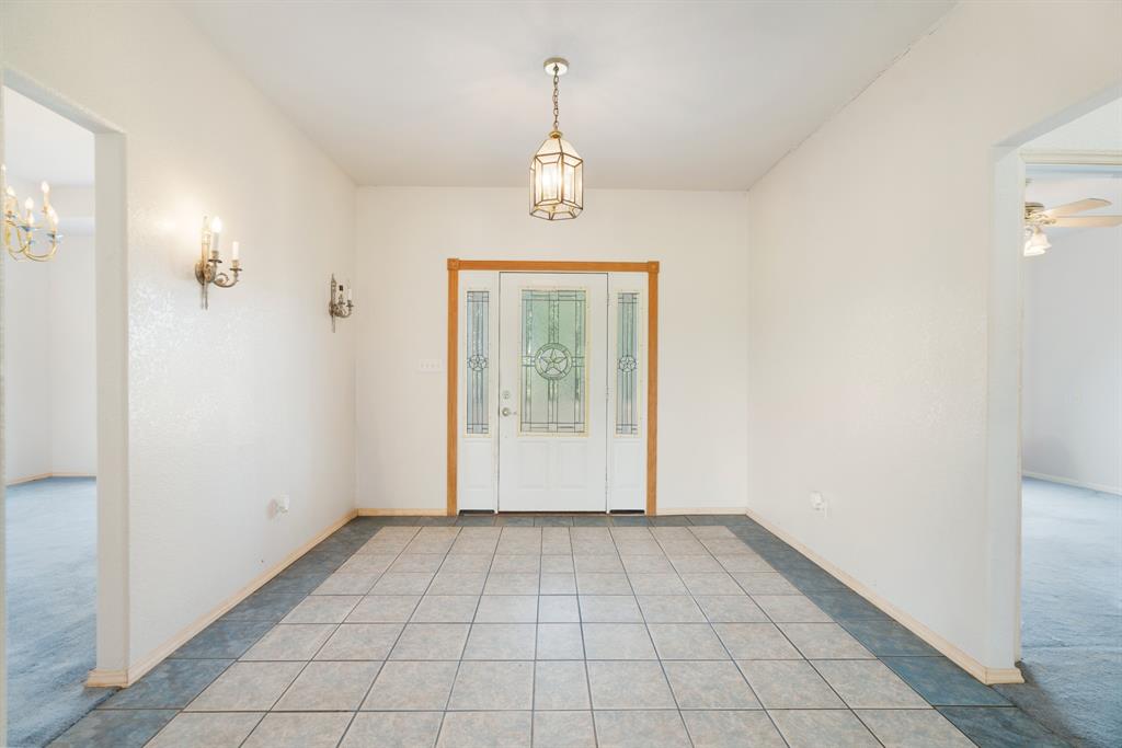 6559 Fm 2068 Commerce, TX 75428 - Photo 25 of 40 a view of an empty room with window