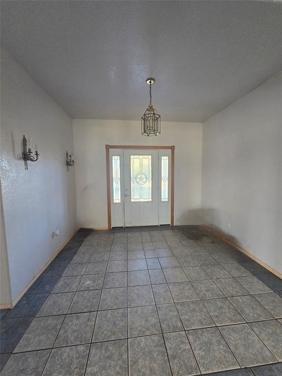 6559 Fm 2068 Commerce, TX 75428 - Photo 27 of 35 a view of an empty room with a window