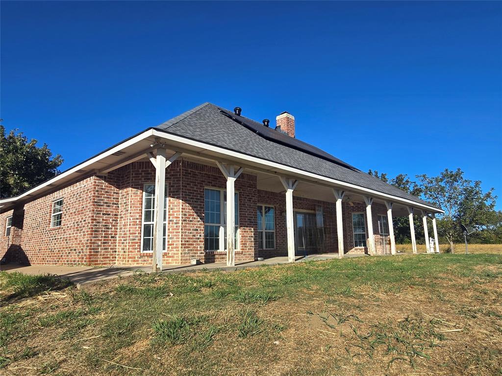 6559 Fm 2068 Commerce, TX 75428 - Photo 9 of 35 a view of a house with backyard