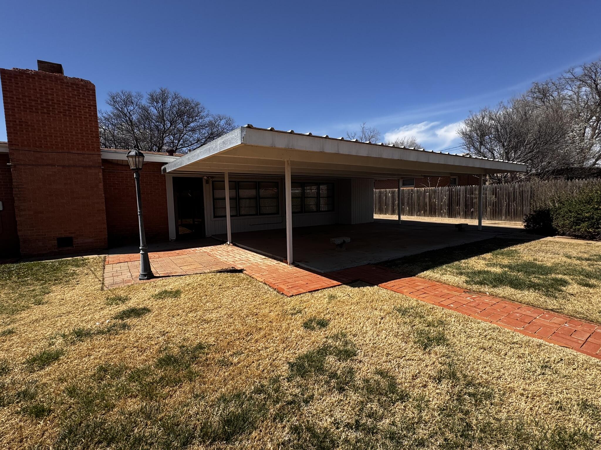 1304 Floydada Plainview, TX 79072 - Photo 39 of 49 a view of a house with a yard