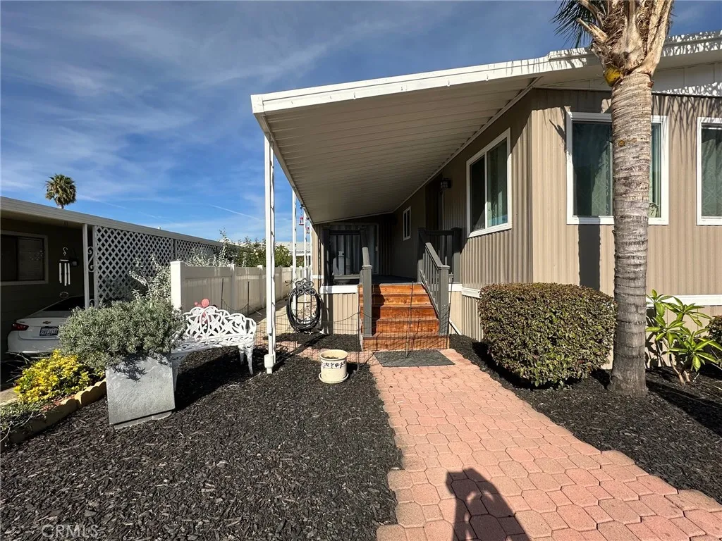 15181 Van Buren, Unit 57 Riverside, CA 92504 - Photo 3 of 38 a view of a back yard of the house