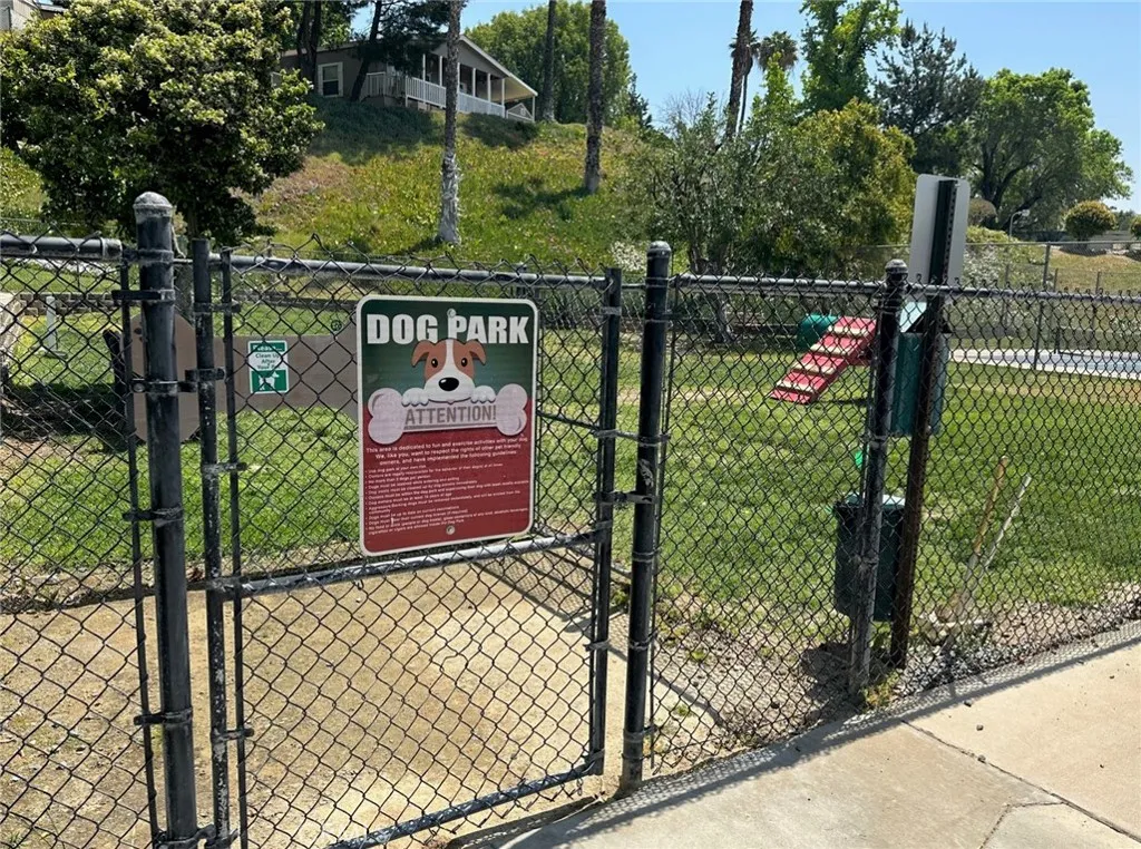 15181 Van Buren, Unit 57 Riverside, CA 92501 - Photo 33 of 38 a view of a pathway of a garden