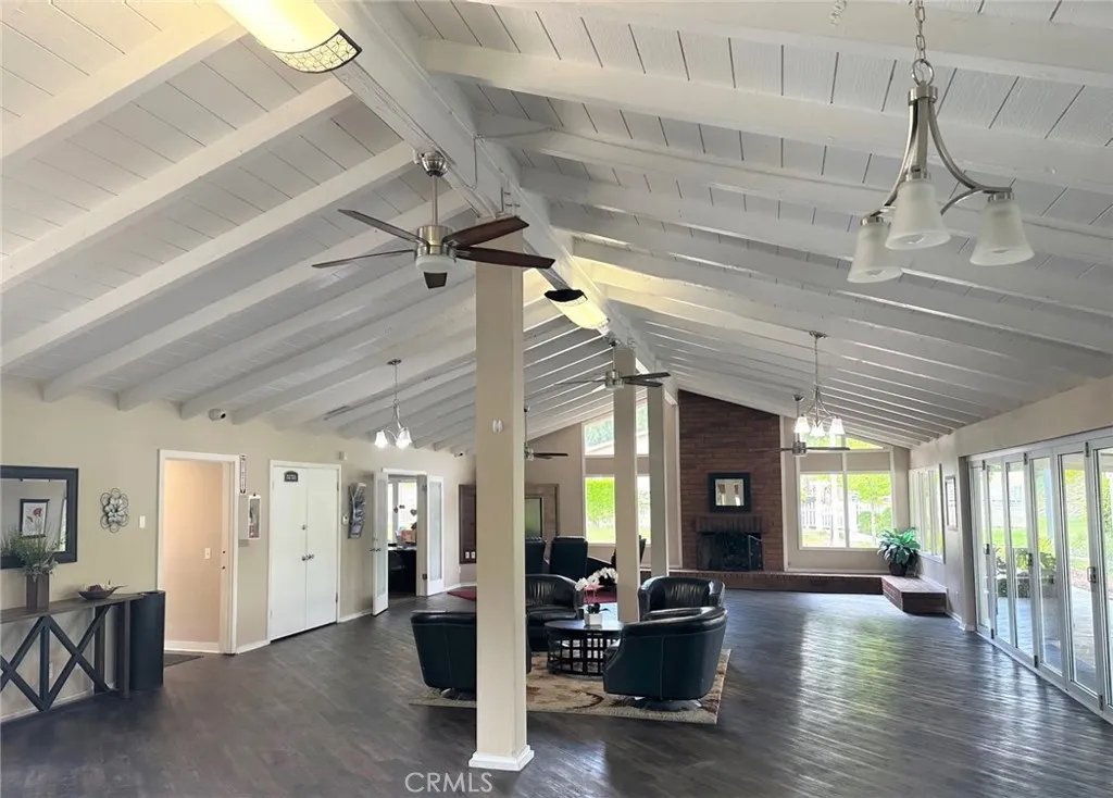 15181 Van Buren, Unit 57 Riverside, CA 92501 - Photo 35 of 38 a living room with furniture window and wooden floor