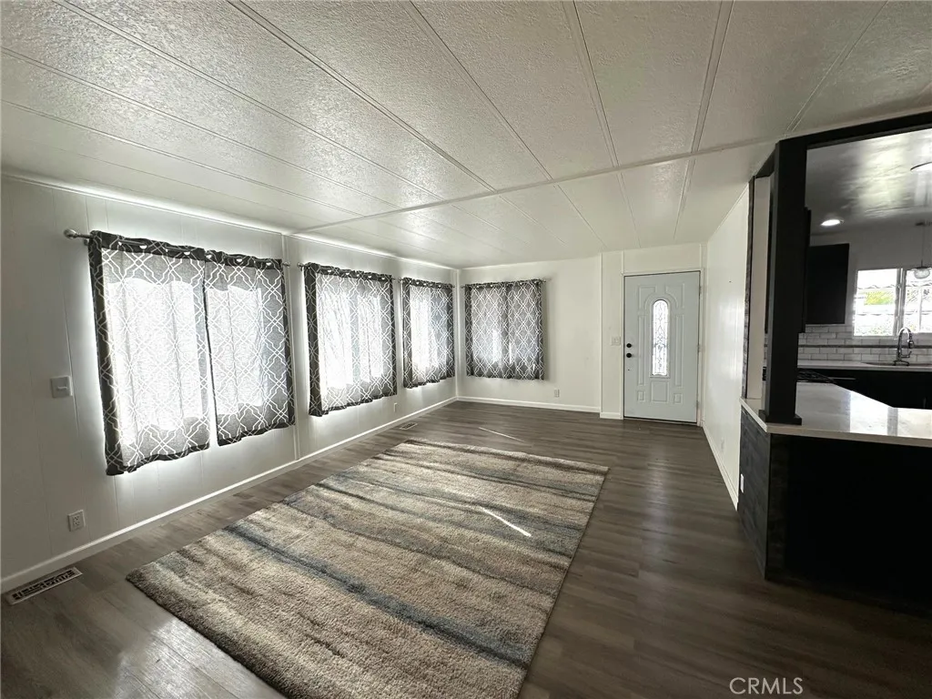 15181 Van Buren, Unit 57 Riverside, CA 92504 - Photo 7 of 38 a view of an empty room and window