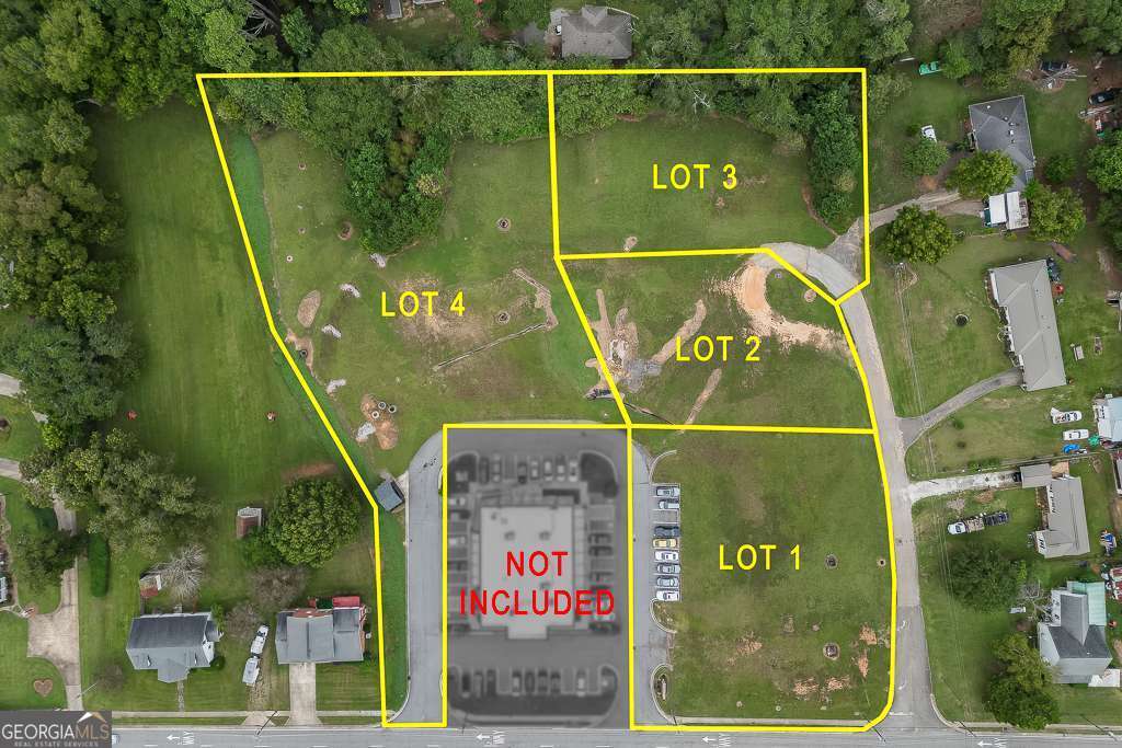 208 Pirkle Ferry Road Cumming, GA 30040 - Photo 1 of 14 a sign that is on the wall