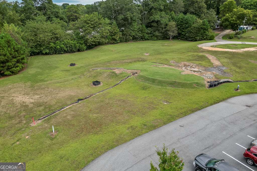208 Pirkle Ferry Road Cumming, GA 30040 - Photo 12 of 14 a view of a field with an ocean