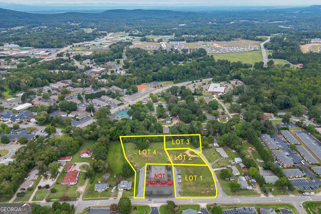 208 Pirkle Ferry Road Cumming, GA 30040 - Photo 4 of 14 an aerial view of multiple house