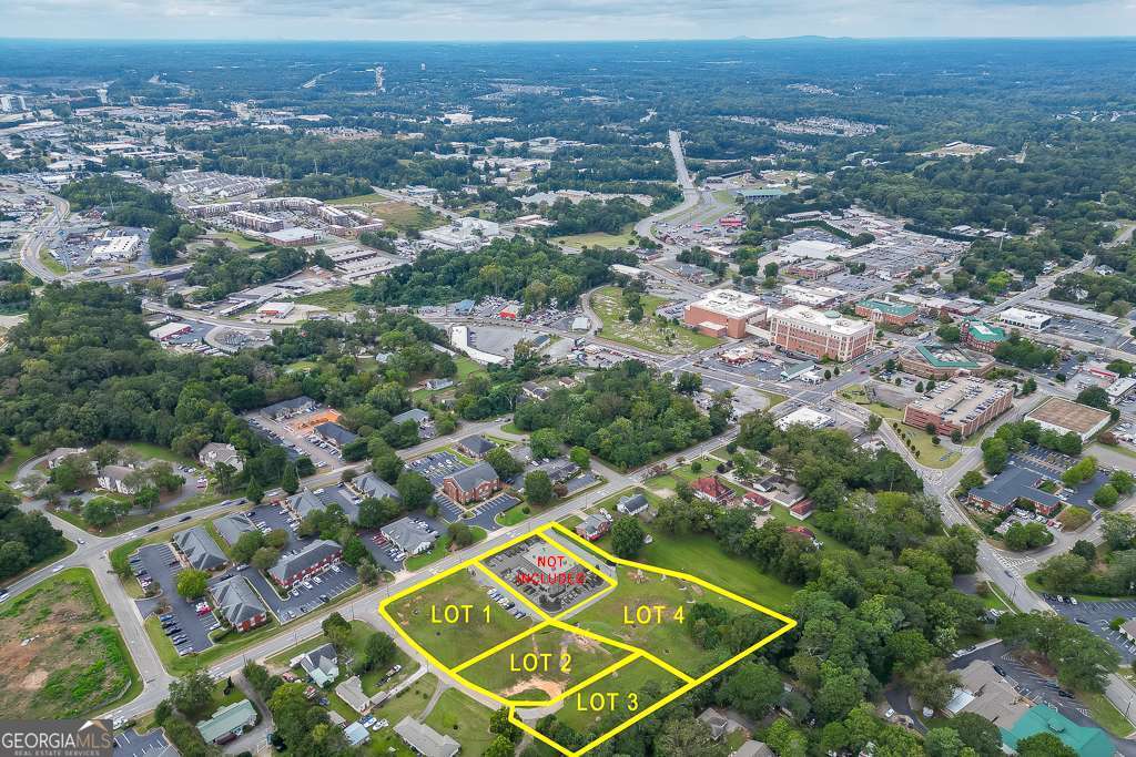 208 Pirkle Ferry Road Cumming, GA 30040 - Photo 6 of 14 an aerial view of residential houses with outdoor space and trees