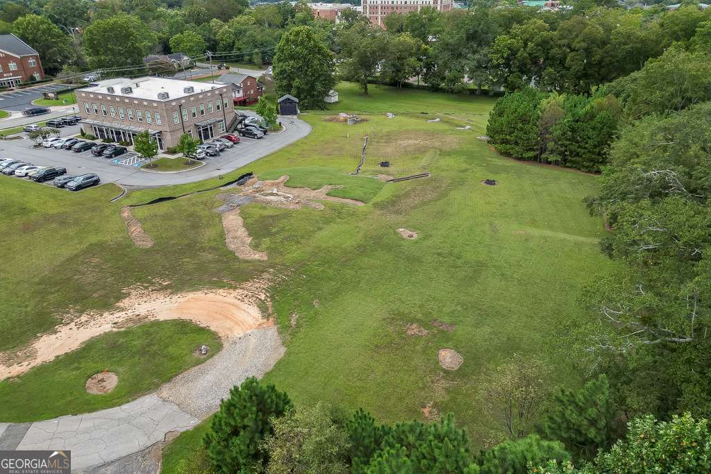 208 Pirkle Ferry Road Cumming, GA 30040 - Photo 8 of 14 a view of a lake with houses