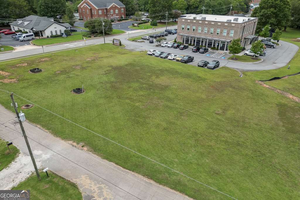 208 Pirkle Ferry Road Cumming, GA 30040 - Photo 10 of 14 a view of a house with a yard