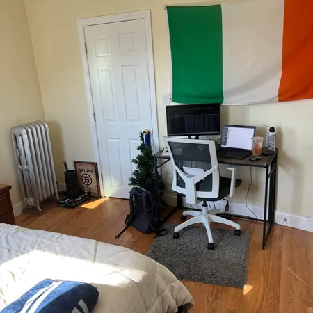 a room with furniture and a flat screen tv