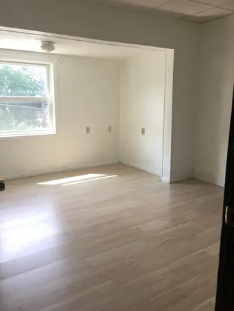 an empty room with a window