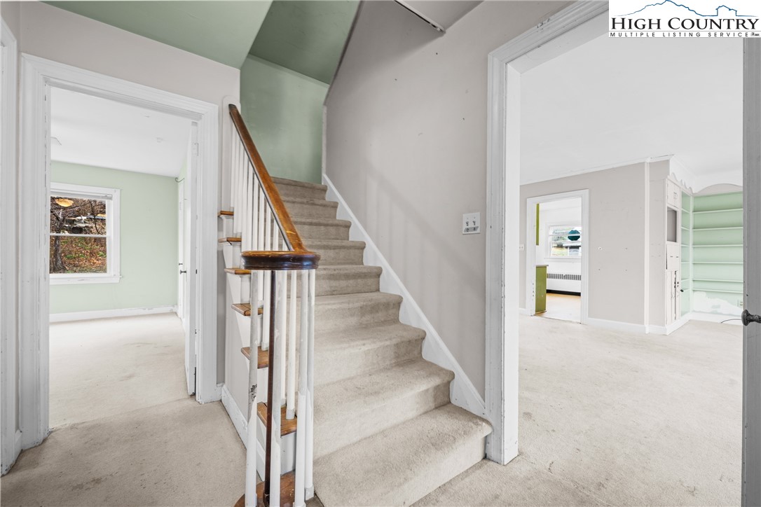 192-206 Orchard Street Boone, NC 28607 - Photo 13 of 50 a view of a hallway with staircase