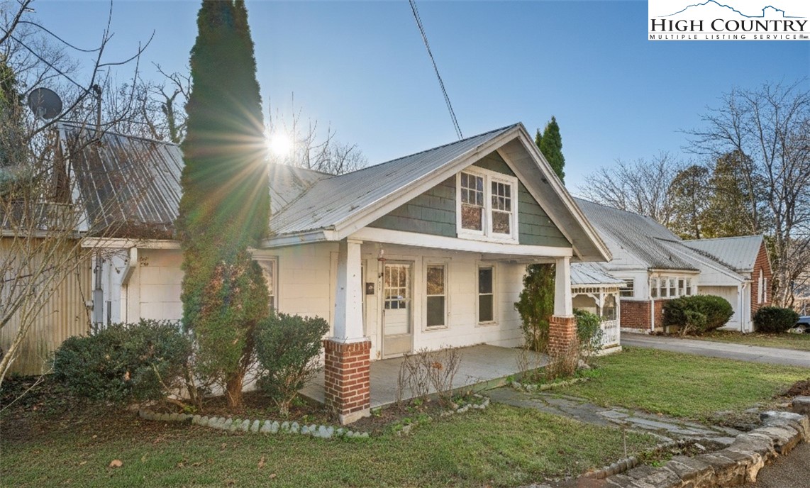 192-206 Orchard Street Boone, NC 28607 - Photo 23 of 50 a front view of a house with a yard