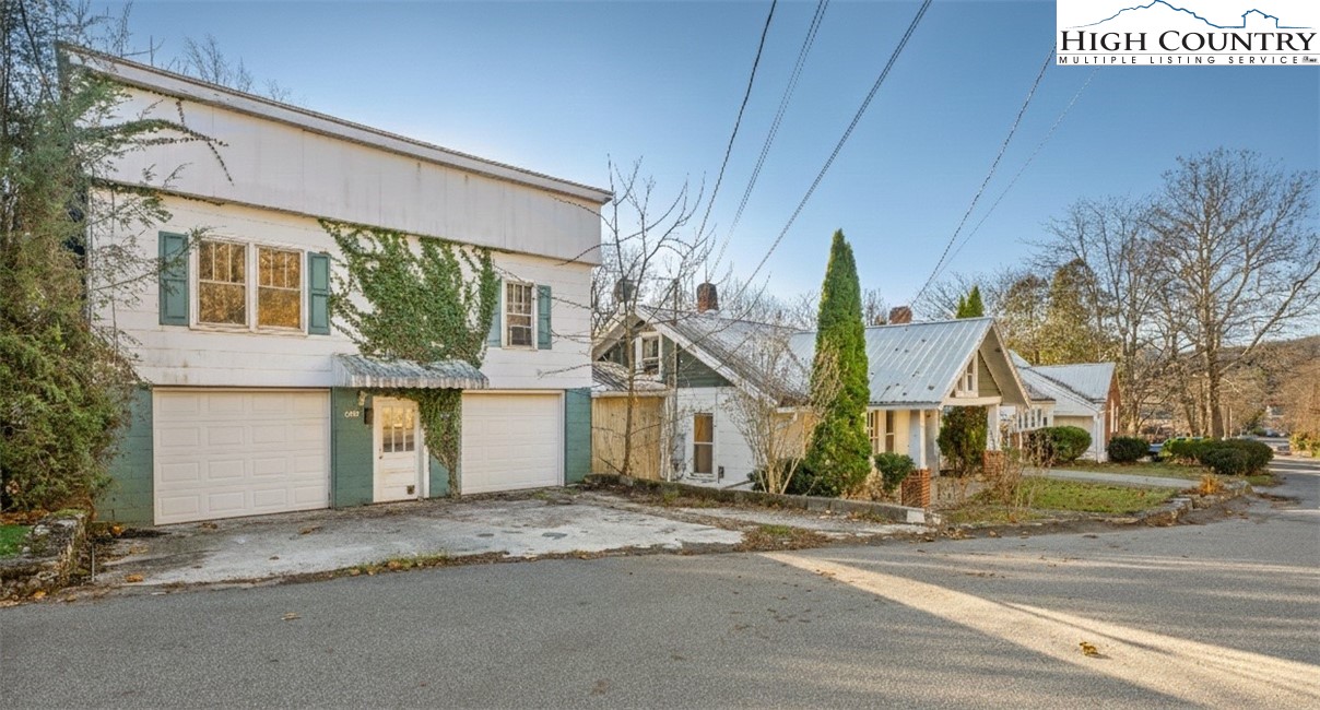 192-206 Orchard Street Boone, NC 28607 - Photo 39 of 50 a view of a house and a yard