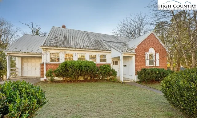 a view of a hallway with staircase