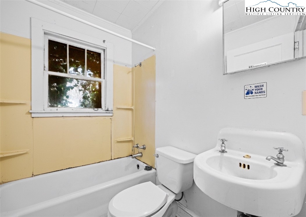 192-206 Orchard Street Boone, NC 28607 - Photo 46 of 50 a bathroom with a sink and a bathtub