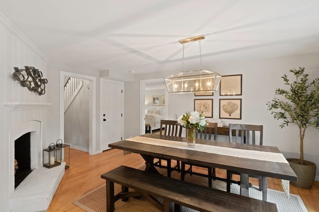 63 West Way Mashpee, MA 02649 - Photo 19 of 41 a view of a dining room with furniture window and wooden floor